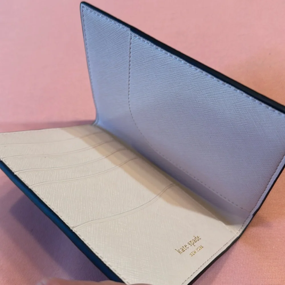 New KATE SPADE Leather Passport Holder. Metal Gold Logo. Black/Pink Interior.